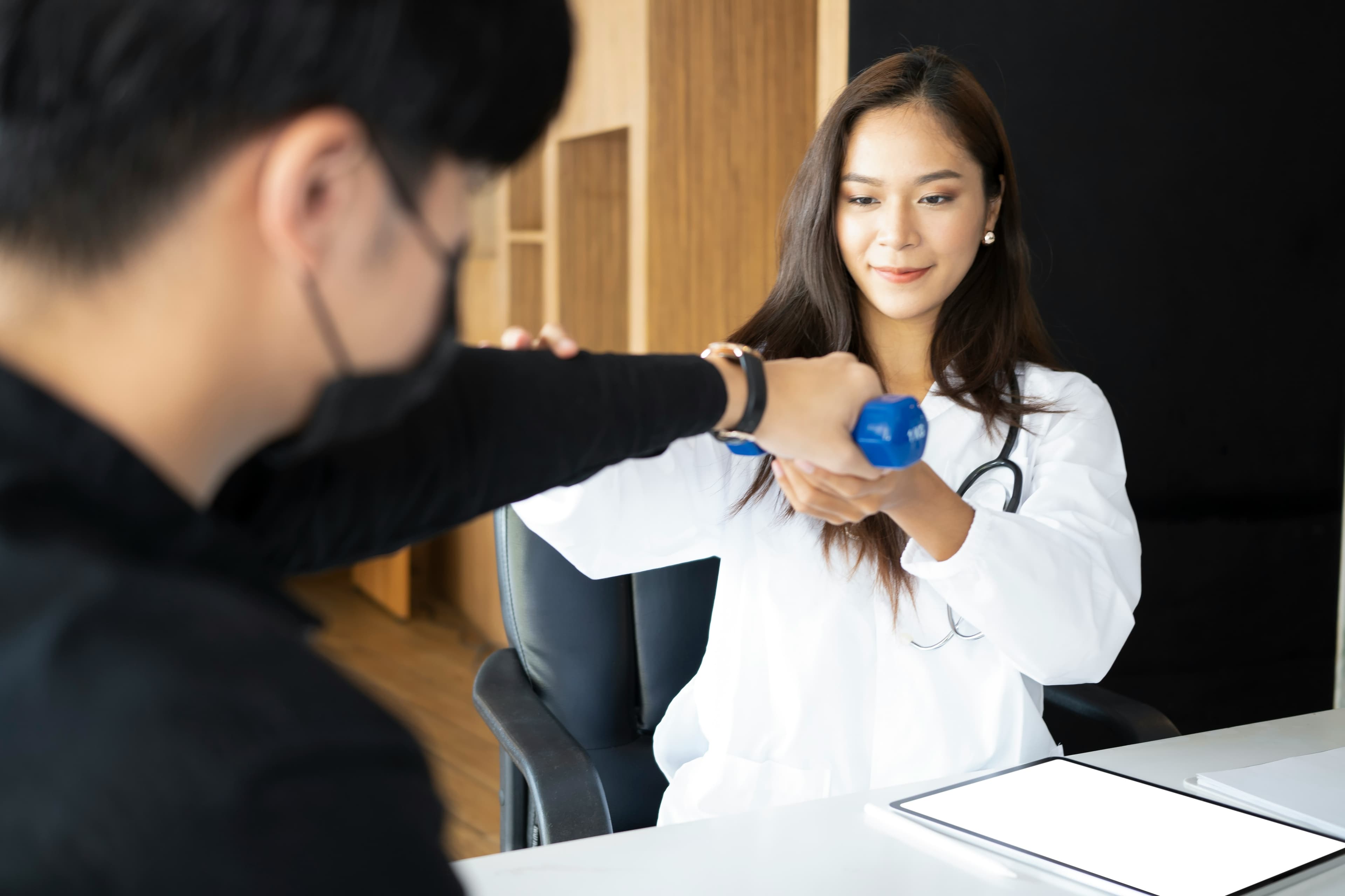 Rehabilitation clinic team using Helia